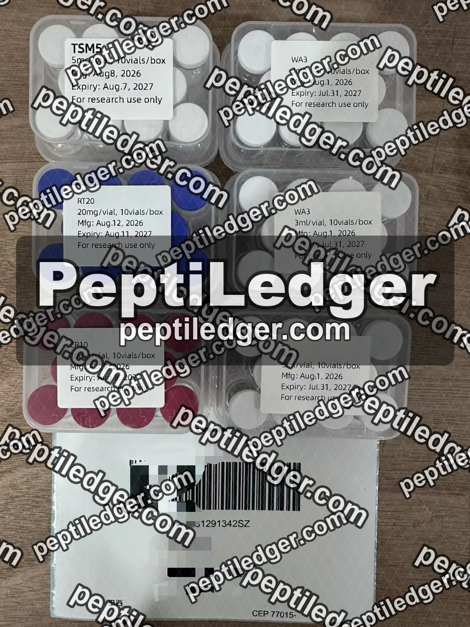 Six clear boxes of ten vials each with white lid labels showing product codes, strength, manufacture and expiry dates, above a courier label with a barcode.